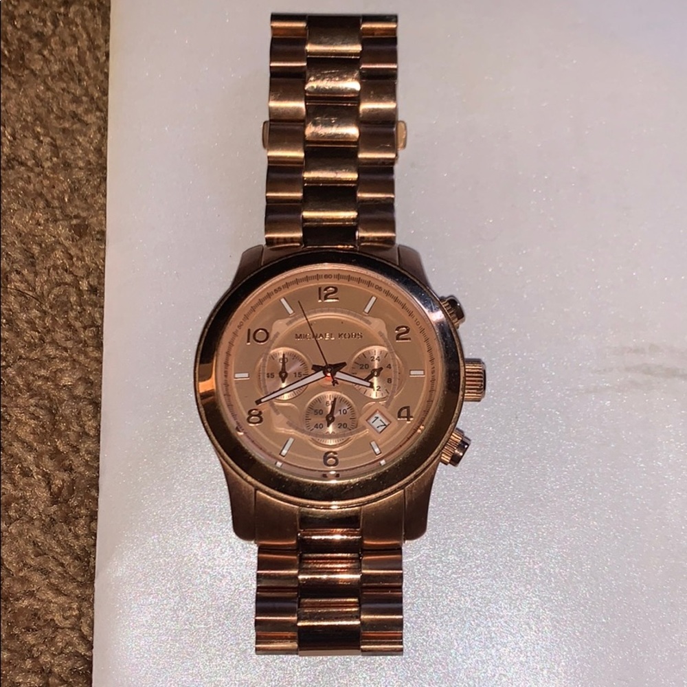 MK rose gold large faced watch